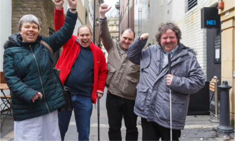 A happy group of people at a FANE event