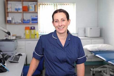 Practice Nurse Rebecca smiles at the camera